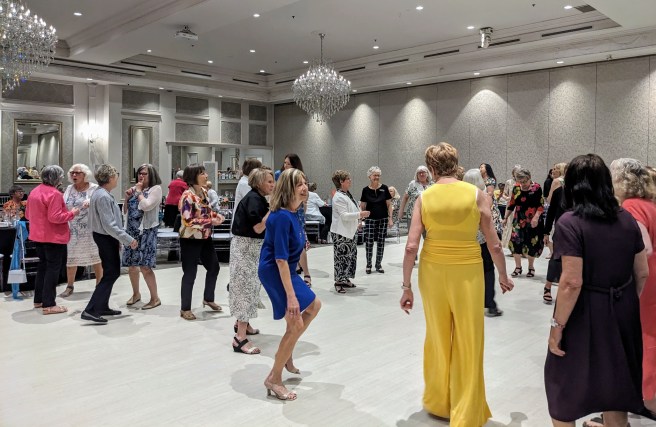 2024_05_28_about 40 ladies on the dance floor in a large circle