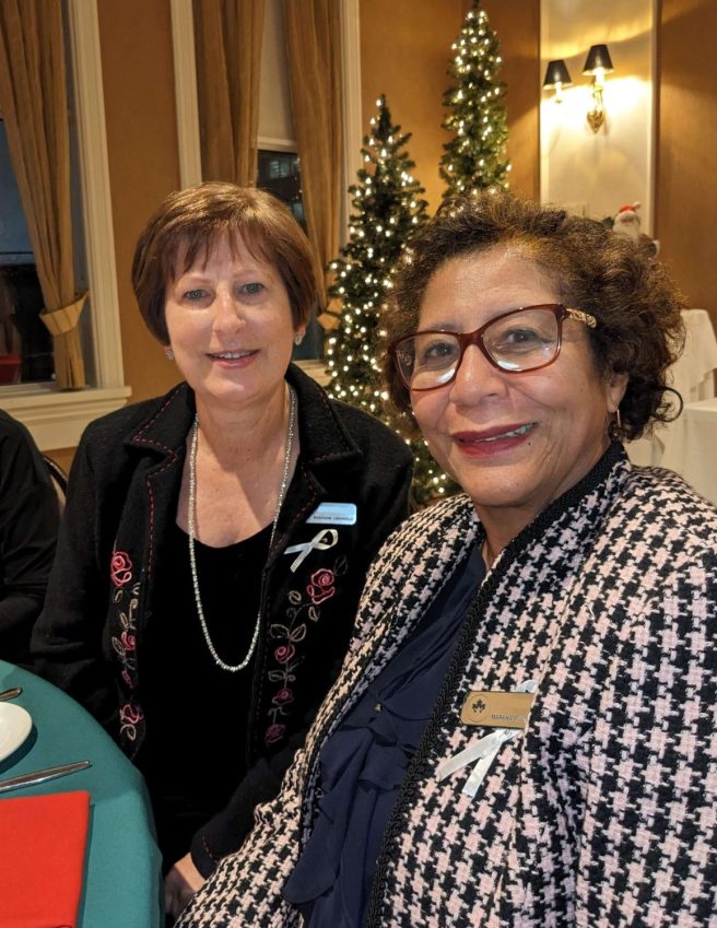 2 ladies in festive dress at Sugar Plum social