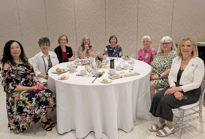 8 friendly women at May banquet