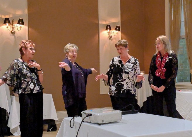 205_12_04 4 ladies lead us in song