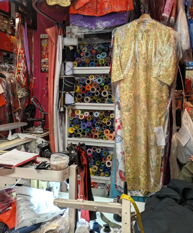 Photography group visits Pacific Mall, shot of dressmaker's shop