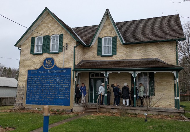 Ladies waiting for a tour on the porch of the Mongomery manse in Leaksdale